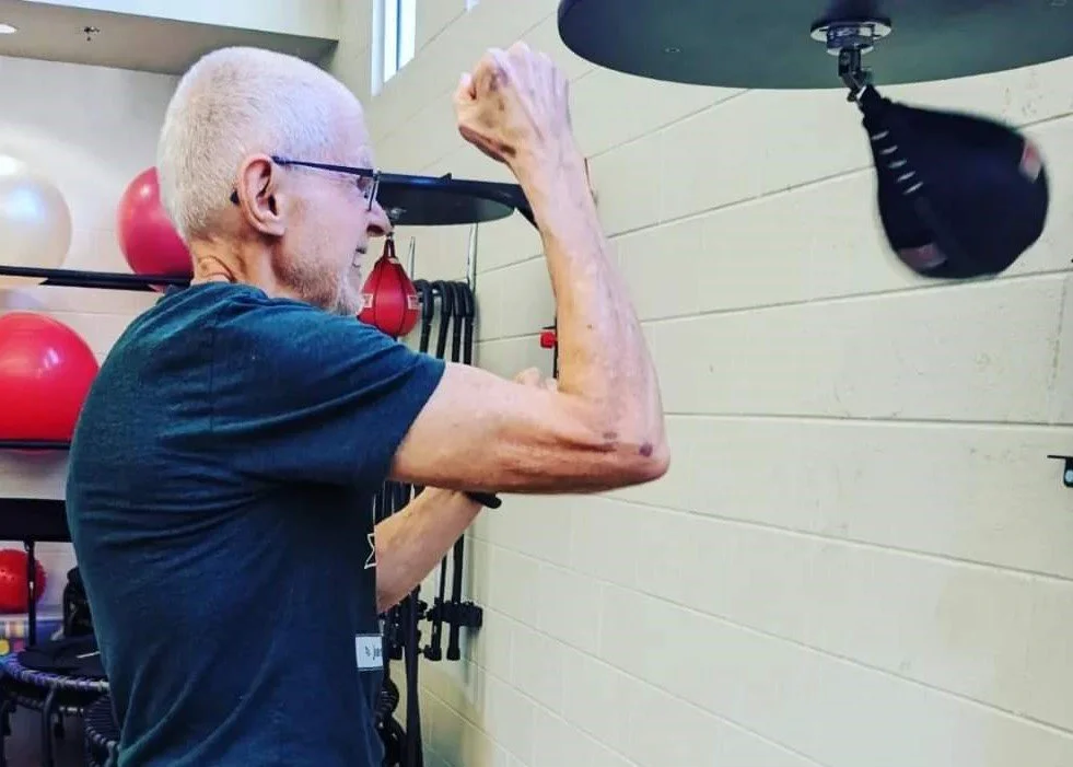 Member hitting a speed bag